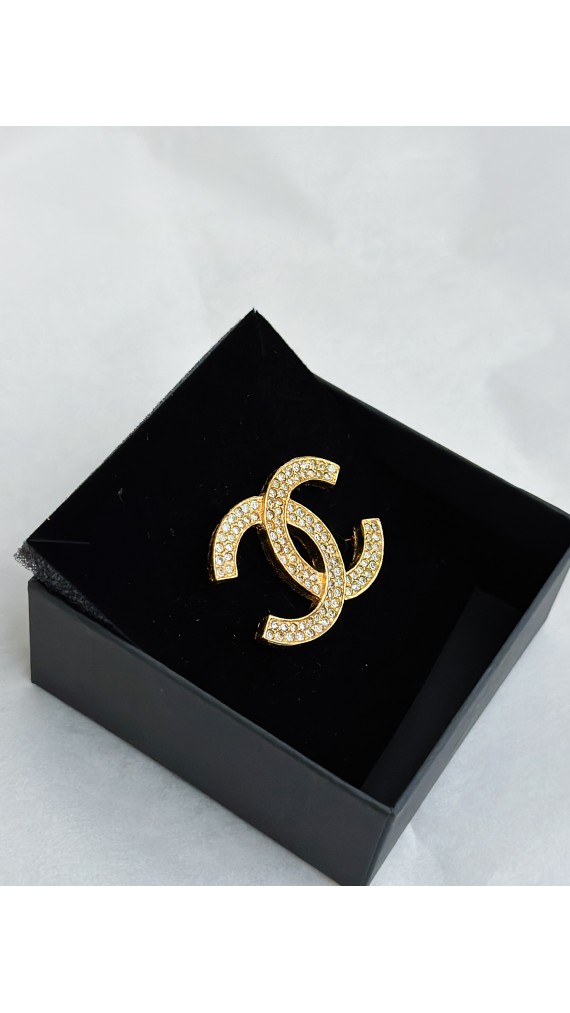 Chanel Brosje