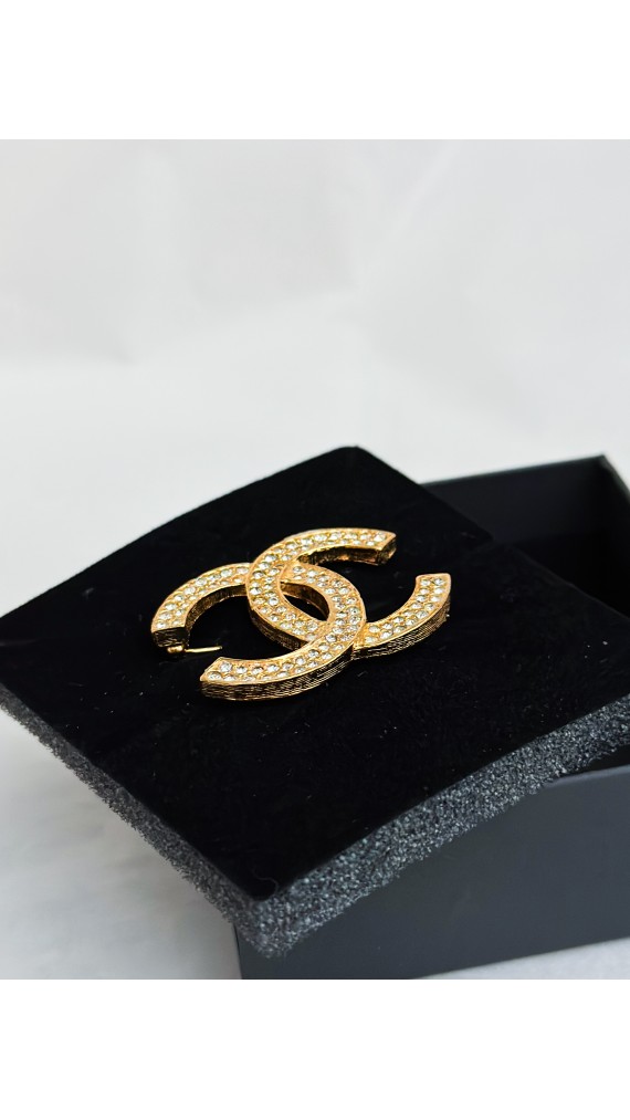 Chanel Brosje