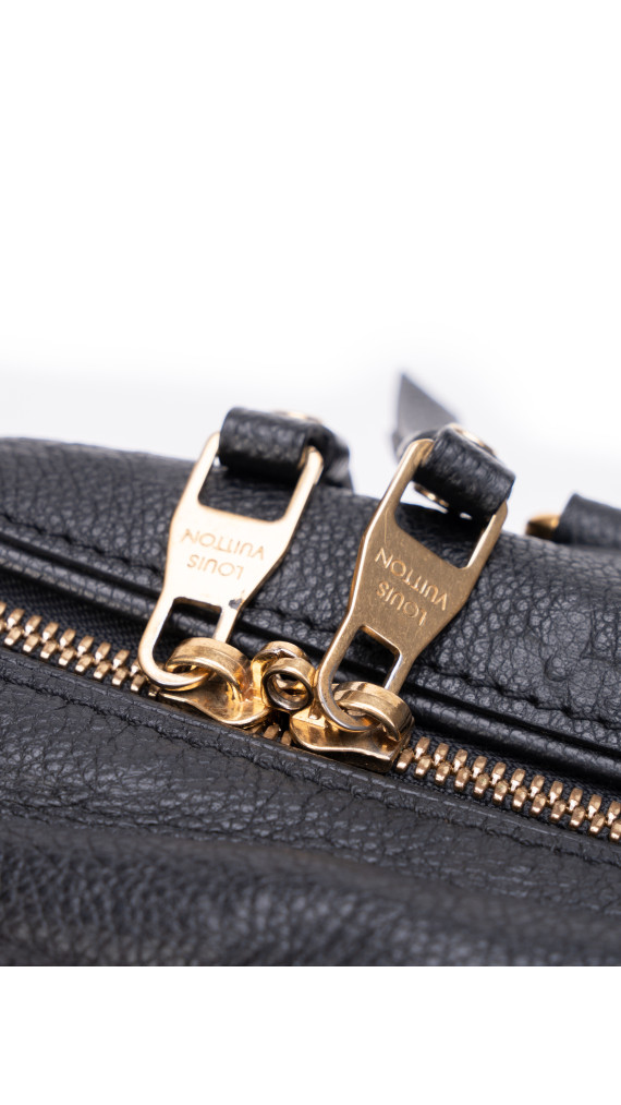 Louis Vuitton Speedy 30 i Monogram Empreinte Skinn