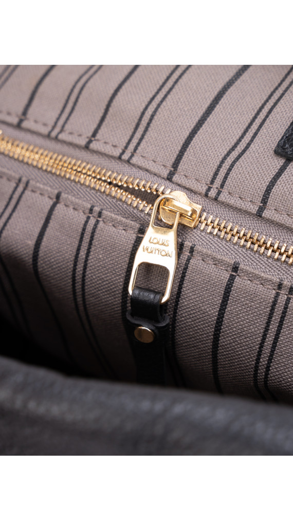 Louis Vuitton Speedy 30 i Monogram Empreinte Skinn
