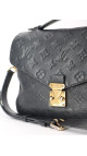 Louis Vuitton Pochette Métis i sort Monogram Empreinte-skinn