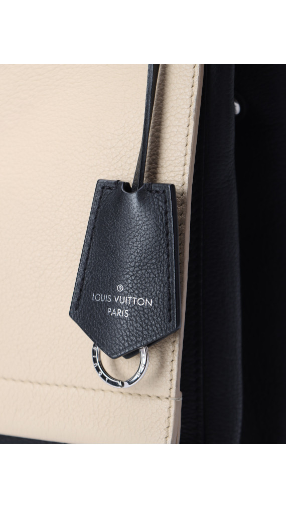 Louis Vuitton Lockme i to-tonet beige og svart shoulder bag